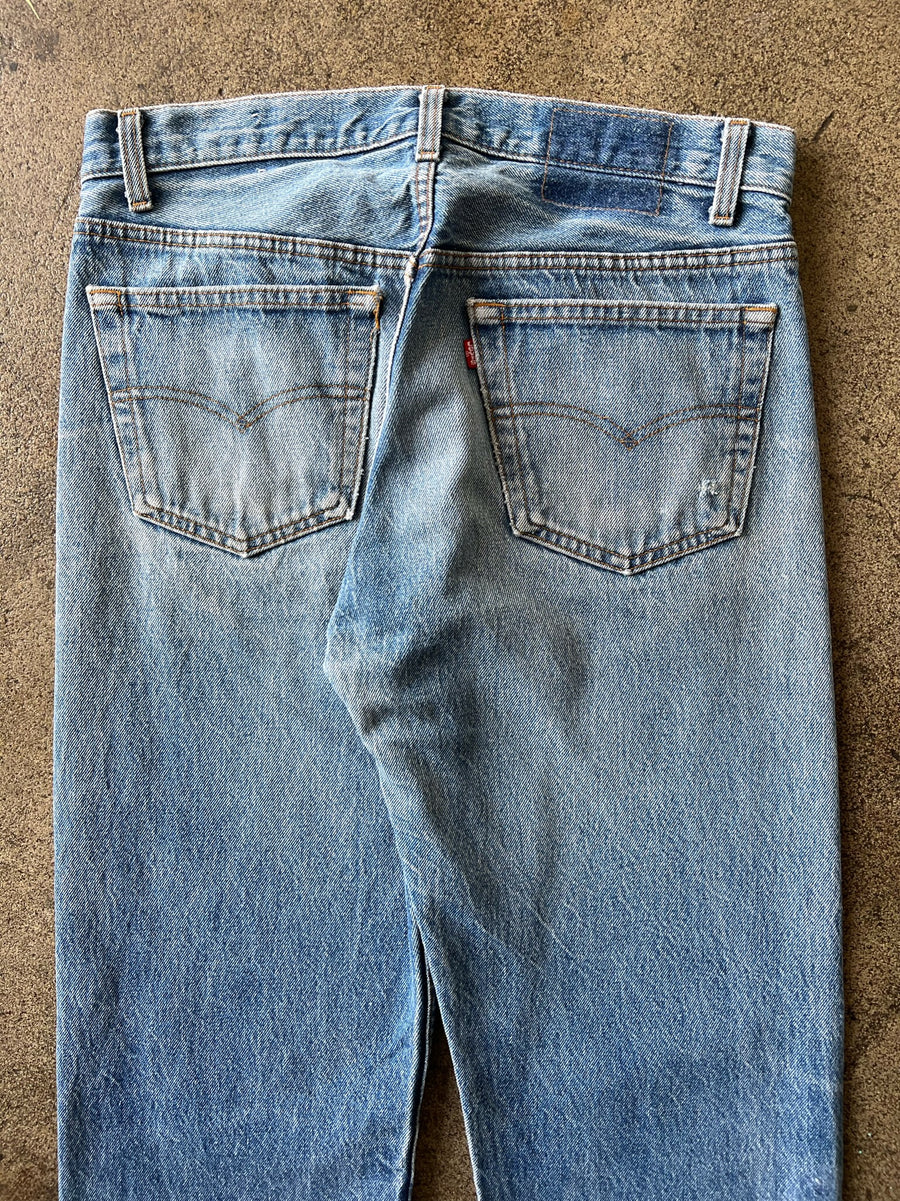 1990s Levi's 501 Faded Mid Wash Jeans 32