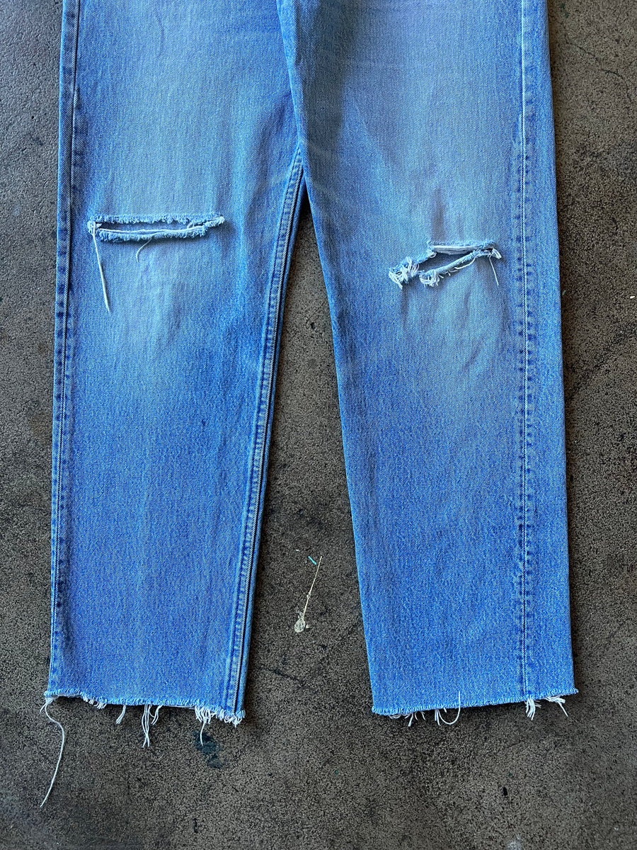 1990s Levi's 501 Faded Blue Raw Hem Jeans 34