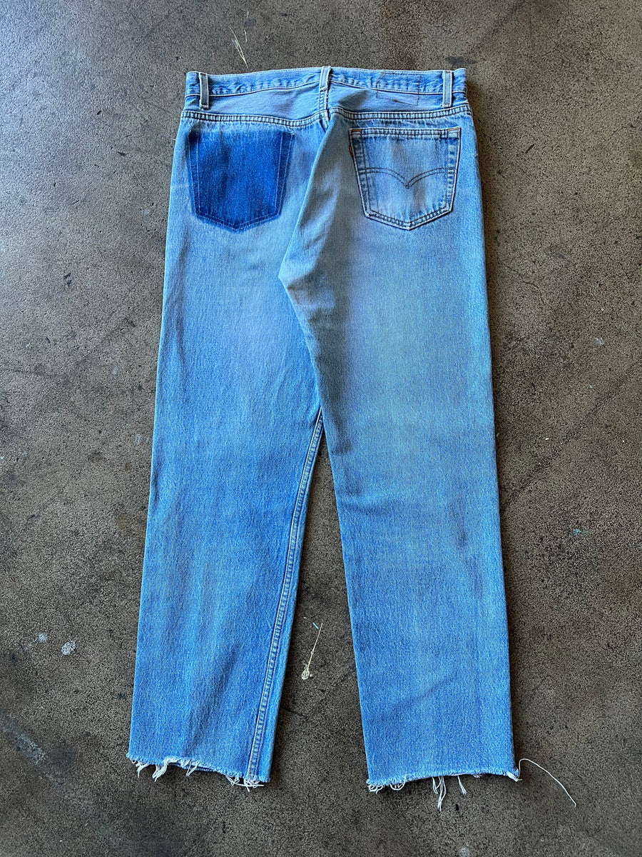 1990s Levi's 501 Faded Blue Raw Hem Jeans 34