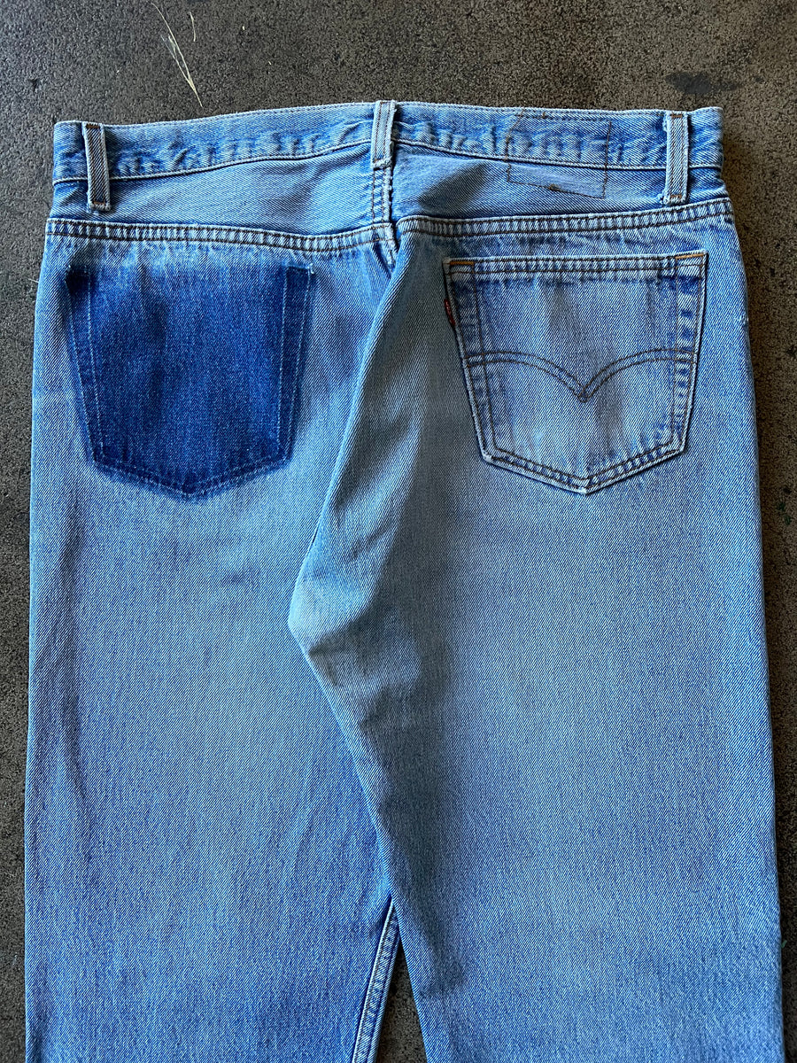 1990s Levi's 501 Faded Blue Raw Hem Jeans 34