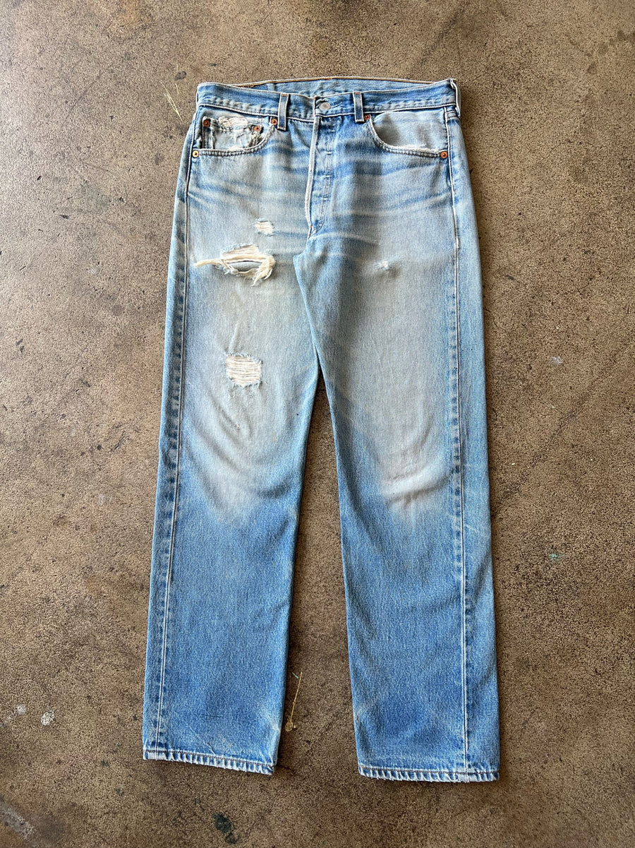 Early 2000s Levi's 501xx Faded + Distressed Jeans 31