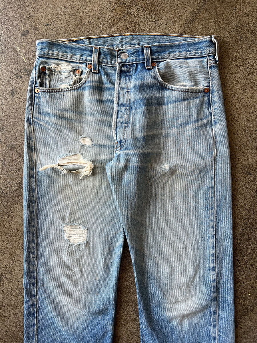 Early 2000s Levi's 501xx Faded + Distressed Jeans 31