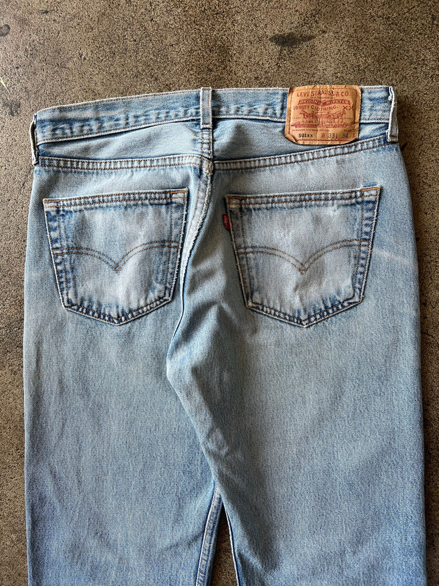 Early 2000s Levi's 501xx Faded + Distressed Jeans 31