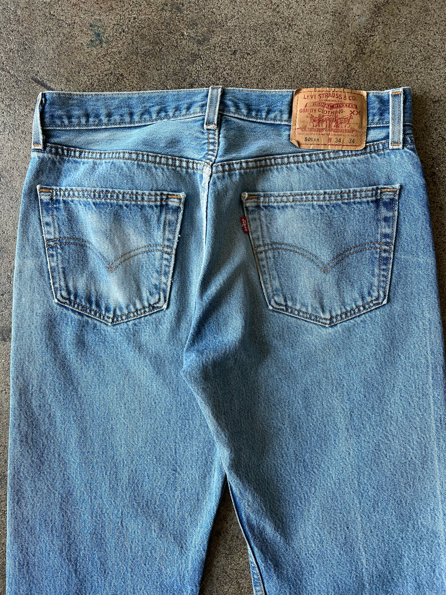 1990s Levi's 501xx Jeans Faded + Distressed 32
