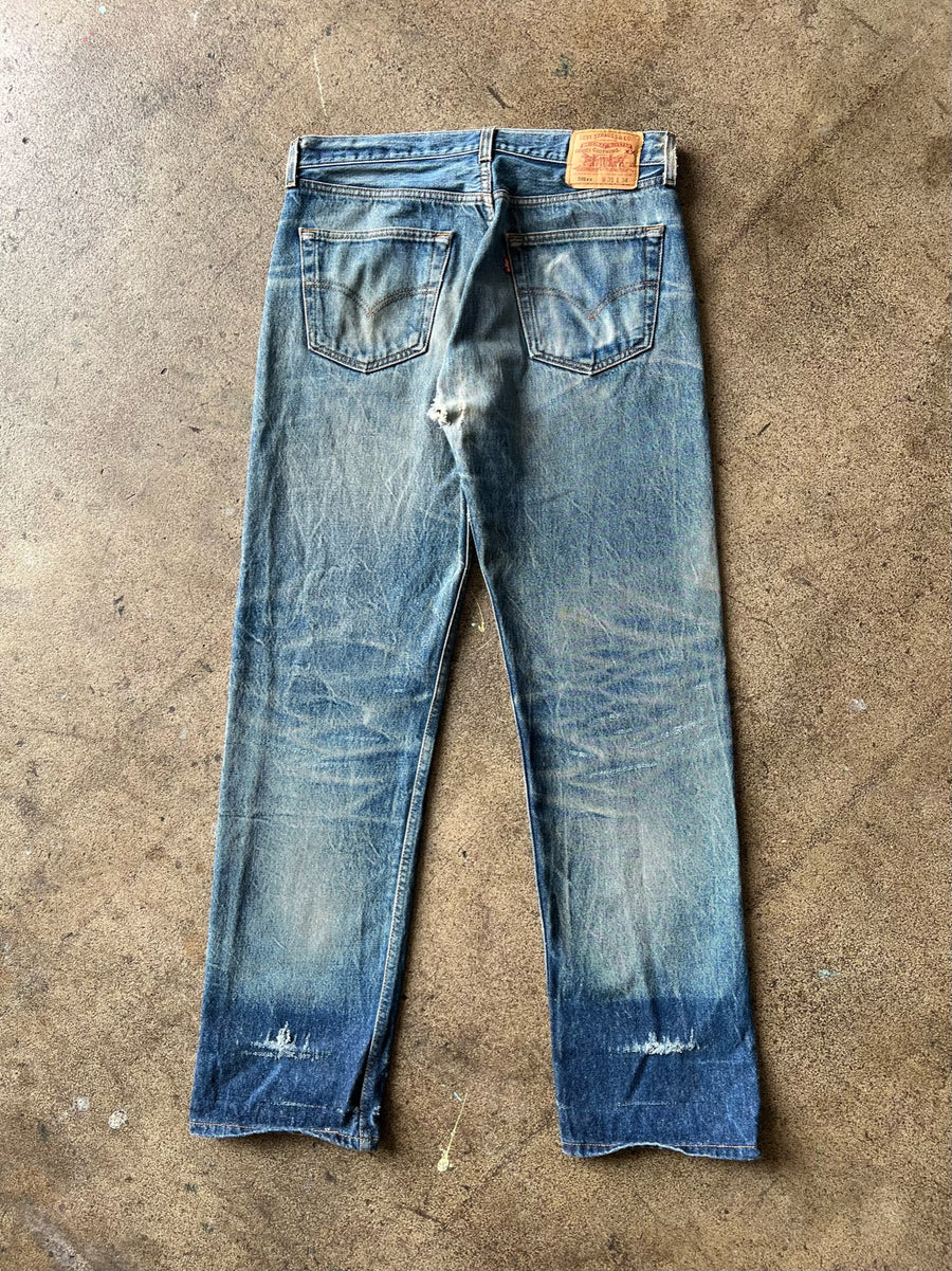 1990s Levi's 501xx Jeans Faded + Distressed 33