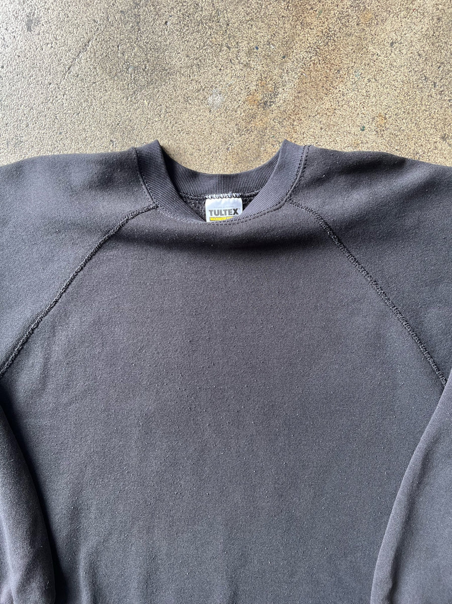 1990s Tultex Faded Black Raglan Crewneck Sweatshirt