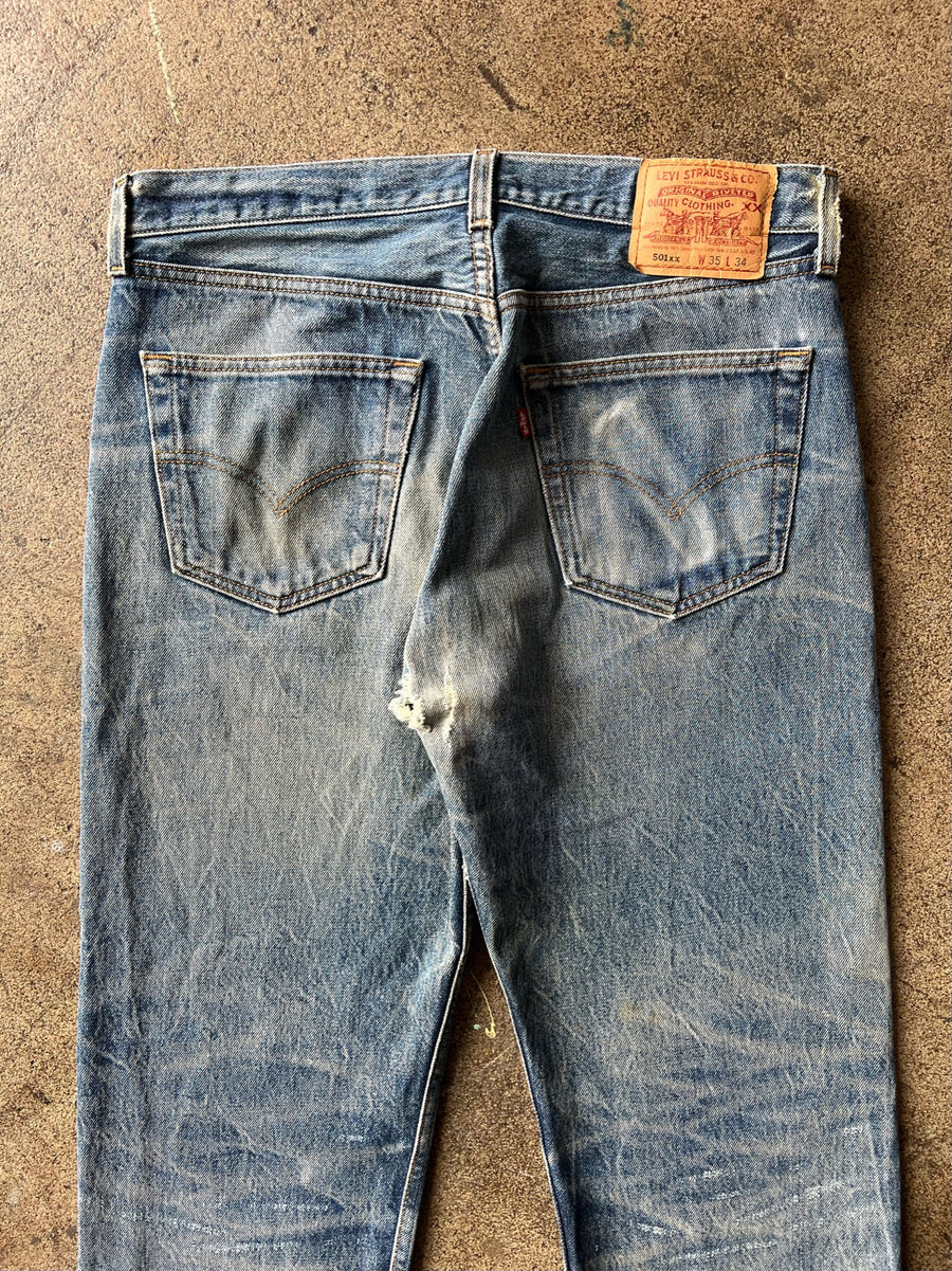 1990s Levi's 501xx Jeans Faded + Distressed 33